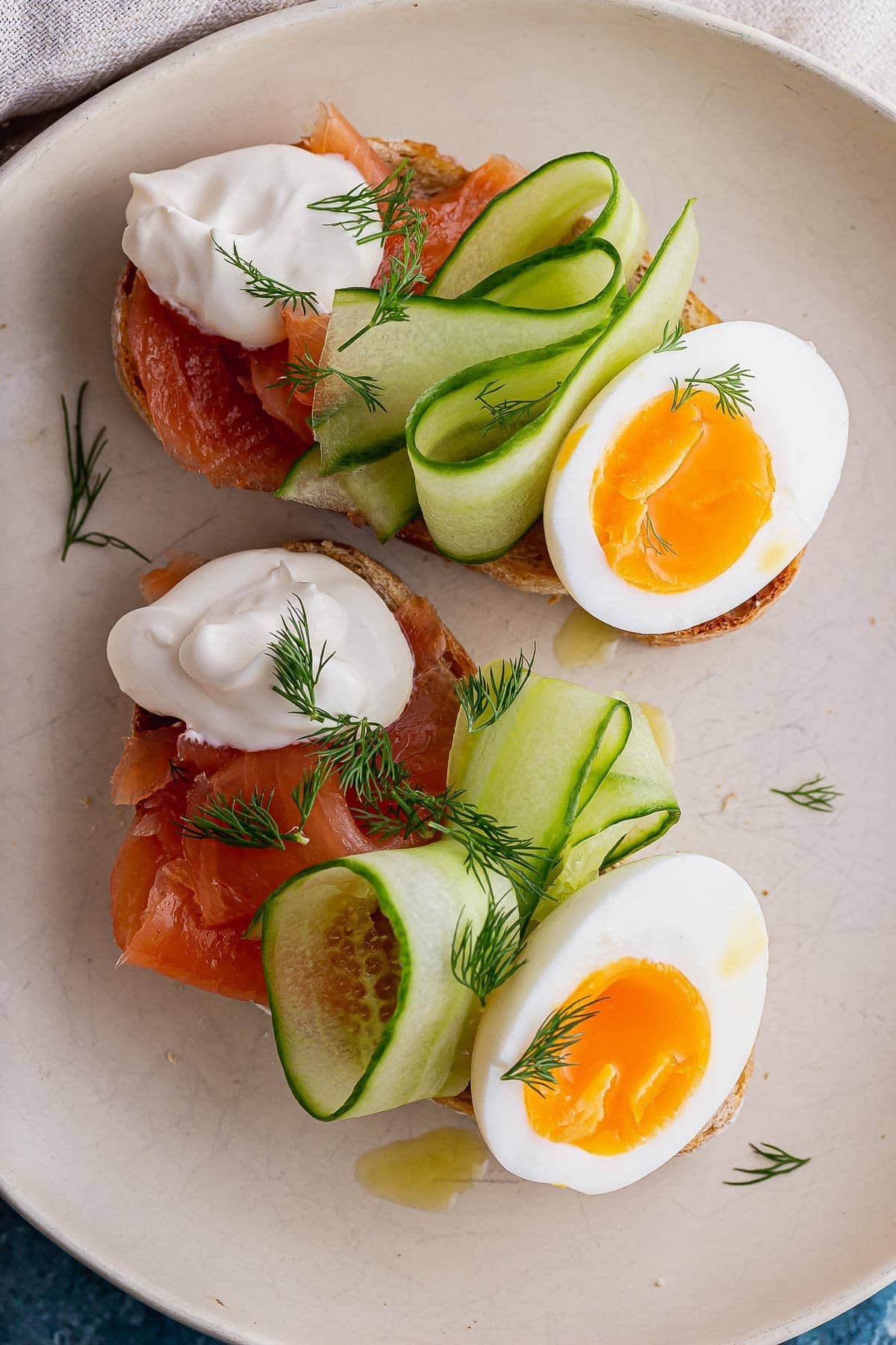 Close up overhead shot of breakfast toasts in a white bowl