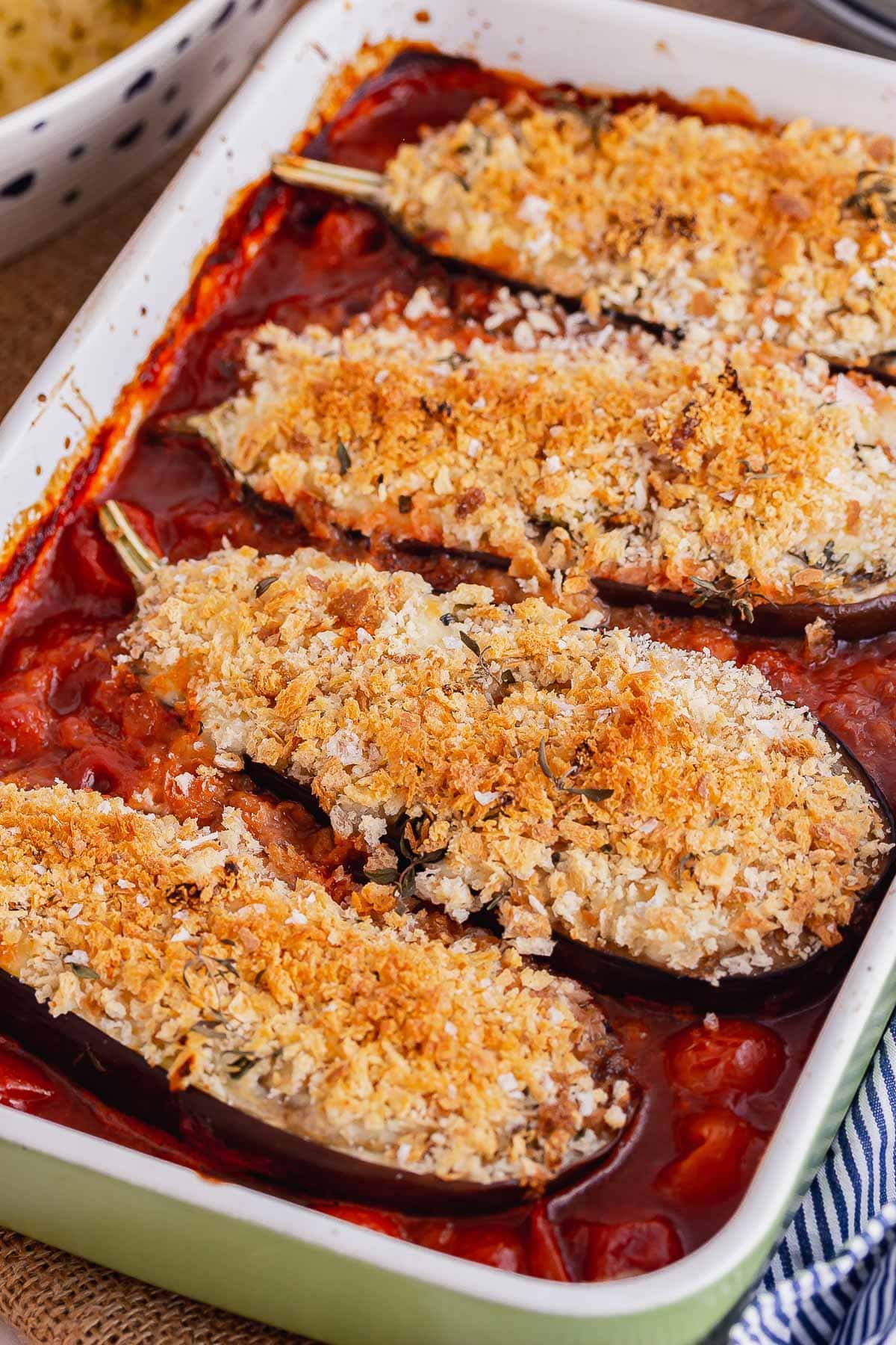 Breadcrumb topped aubergine in a red sauce