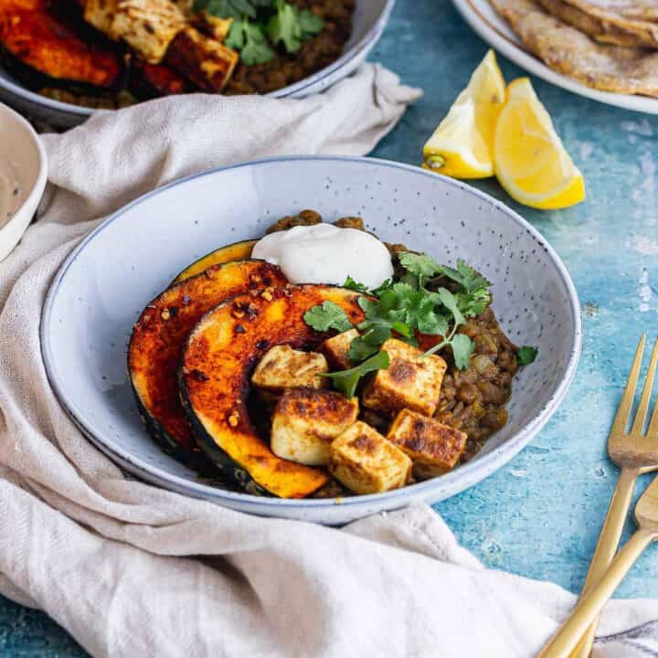 shot of spicy lentils with squash and paneer