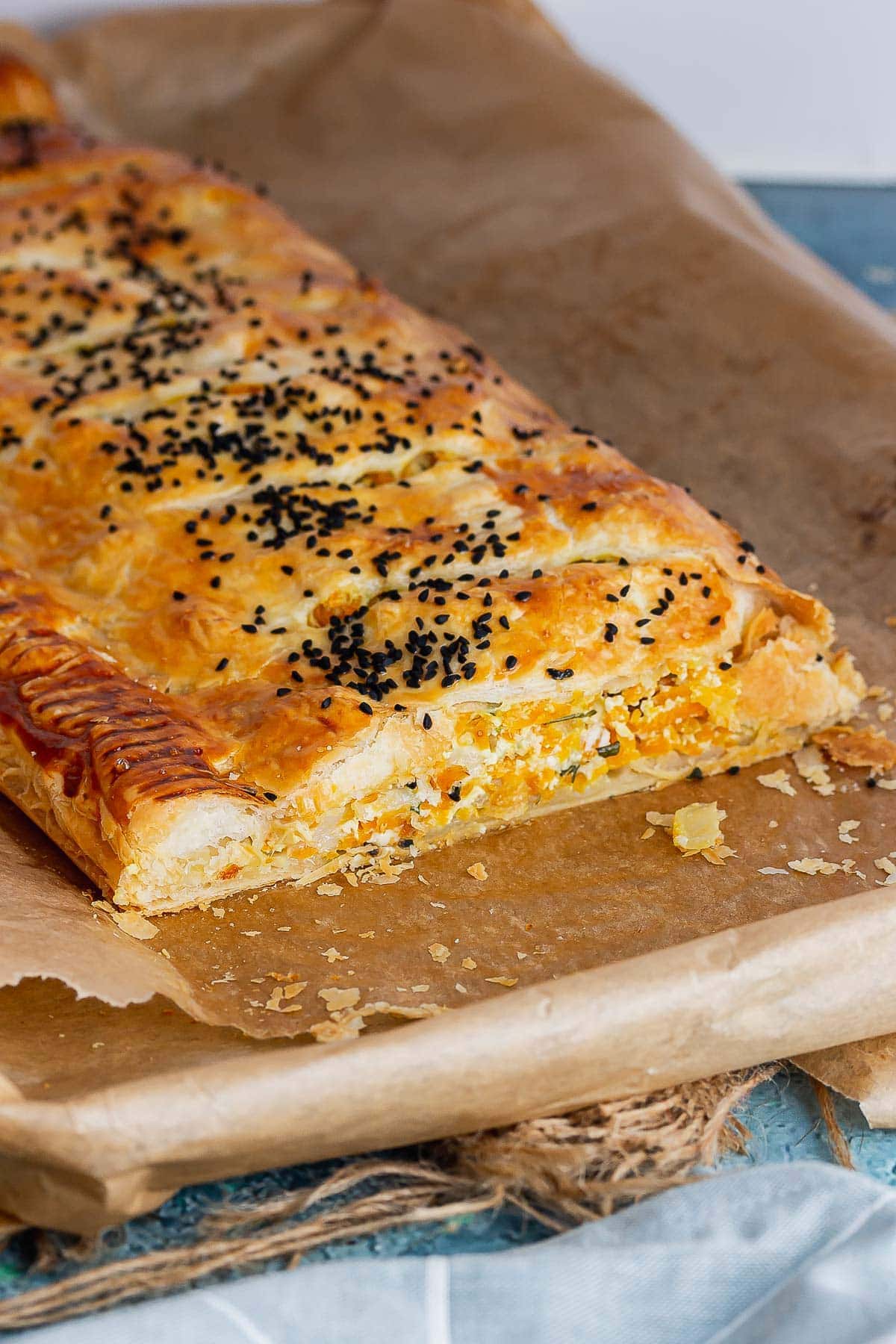 Veggie wellington cut on a baking sheet