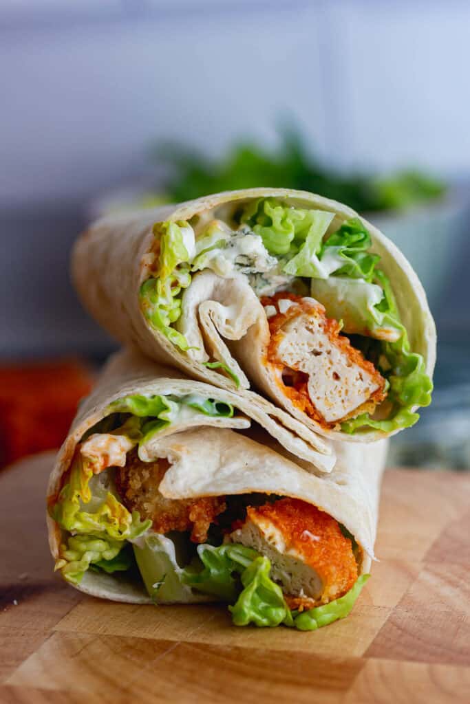 Buffalo tofu wrap on a wooden board