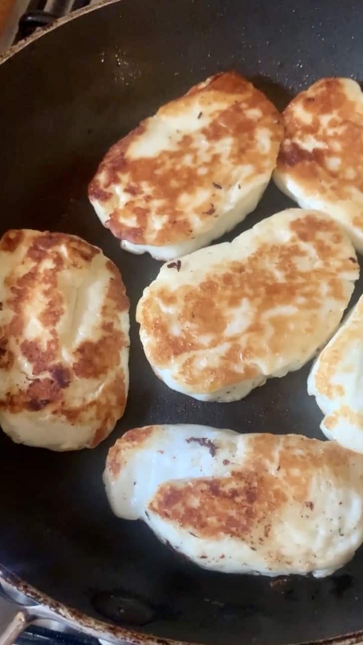 Cooked halloumi in a frying pan
