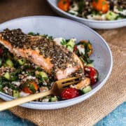Blue bowl of salmon with salad